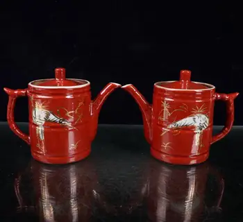 A China Vermelha esmalte cerâmico guindaste bule de artesanato estátua de Um par