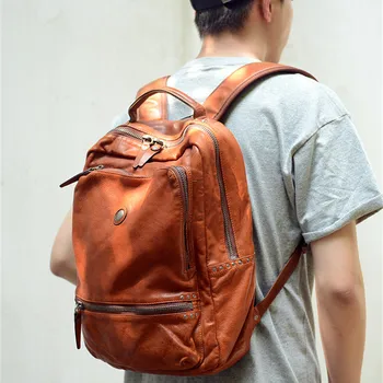 Moda de luxo de couro genuíno homens de grande capacidade mochila casual designer de alta qualidade de couro natural de viagem portátil bagpack